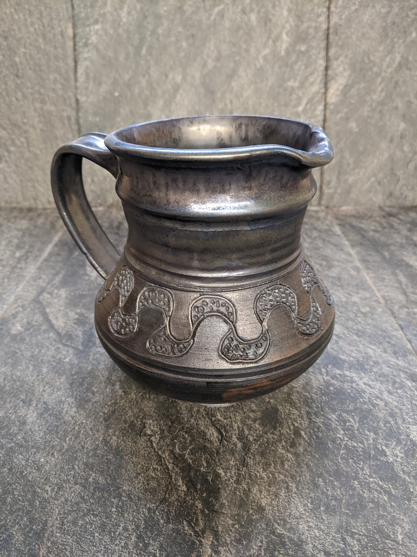 Knotted jug